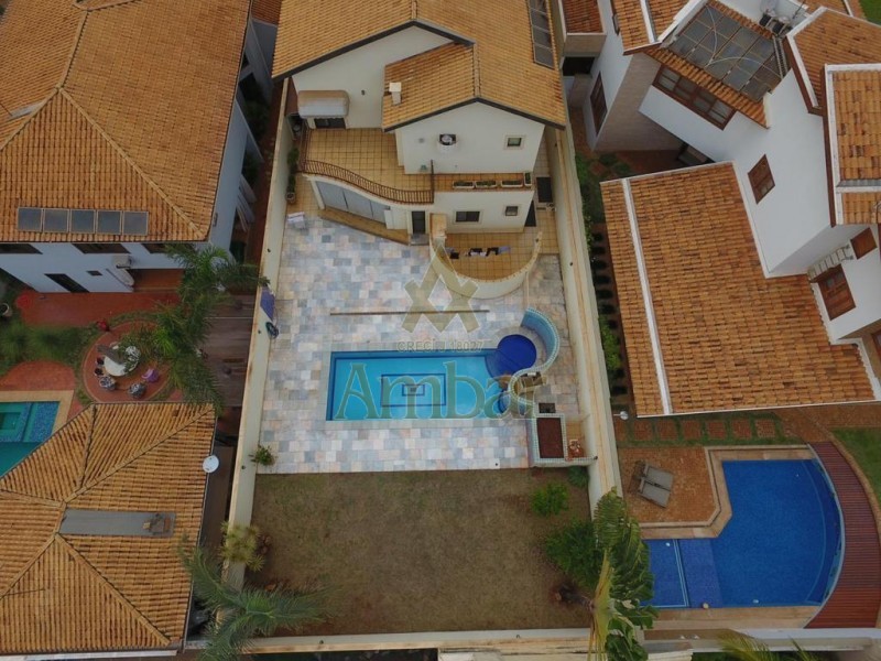 Casa de Condomínio à venda e aluguel com 4 quartos, 450m² - Foto 18