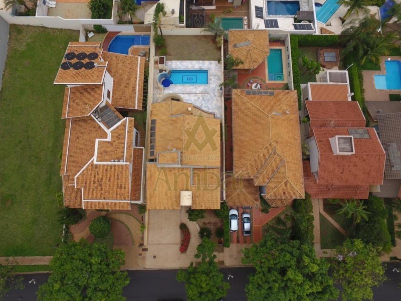 Casa de Condomínio à venda e aluguel com 4 quartos, 450m² - Foto 21